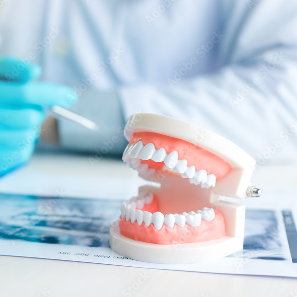 Hand-crafted custom denture